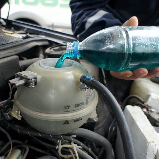 how to put coolant in car