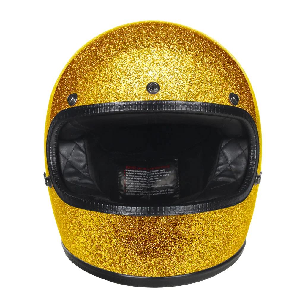 gold motorcycle helmet