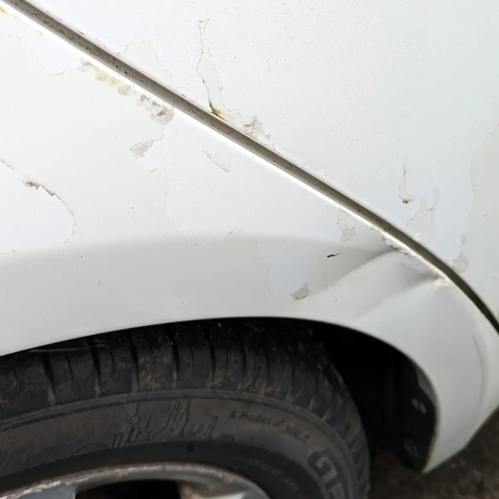 how to remove a dent from a car