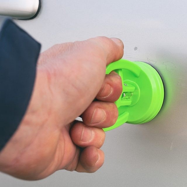 how to remove a dent from a car