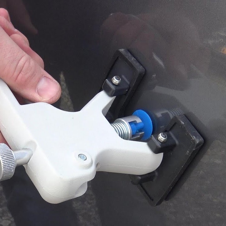 how to remove a dent from a car