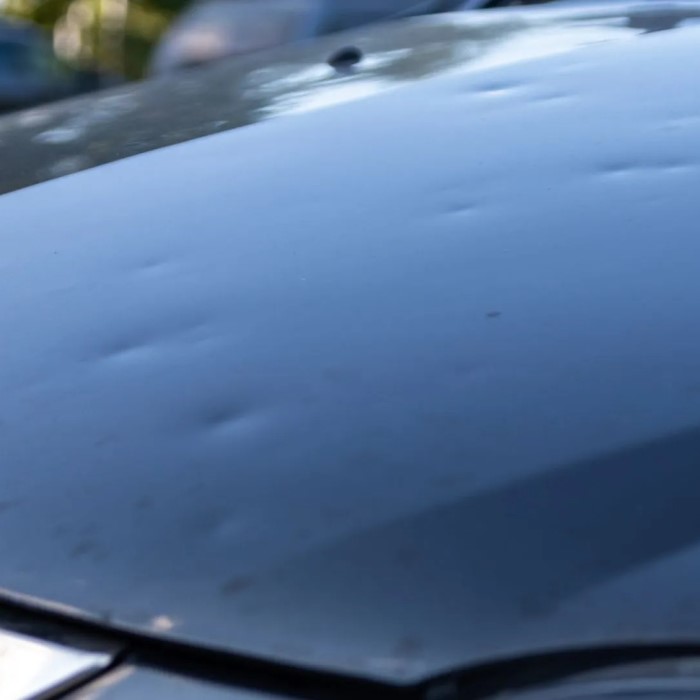 how to remove a dent from a car